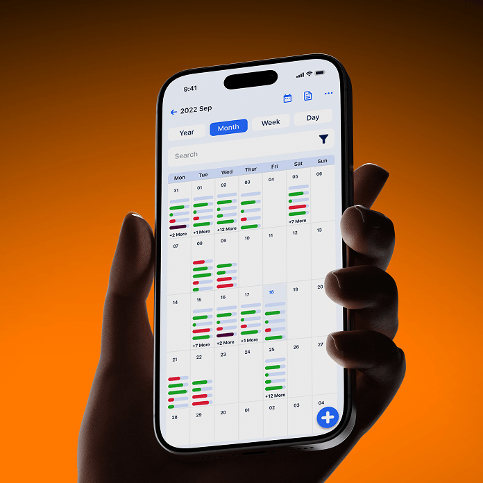 Vida Dynamics mobile calendar view held in hand