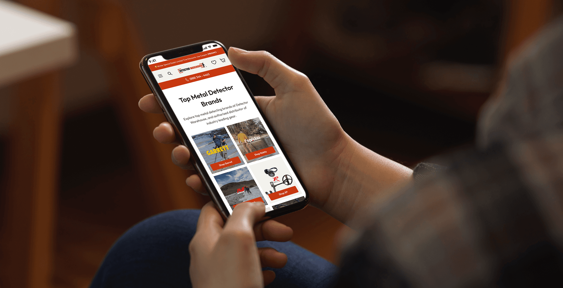 Detector Warehouse mobile storefront held in hand