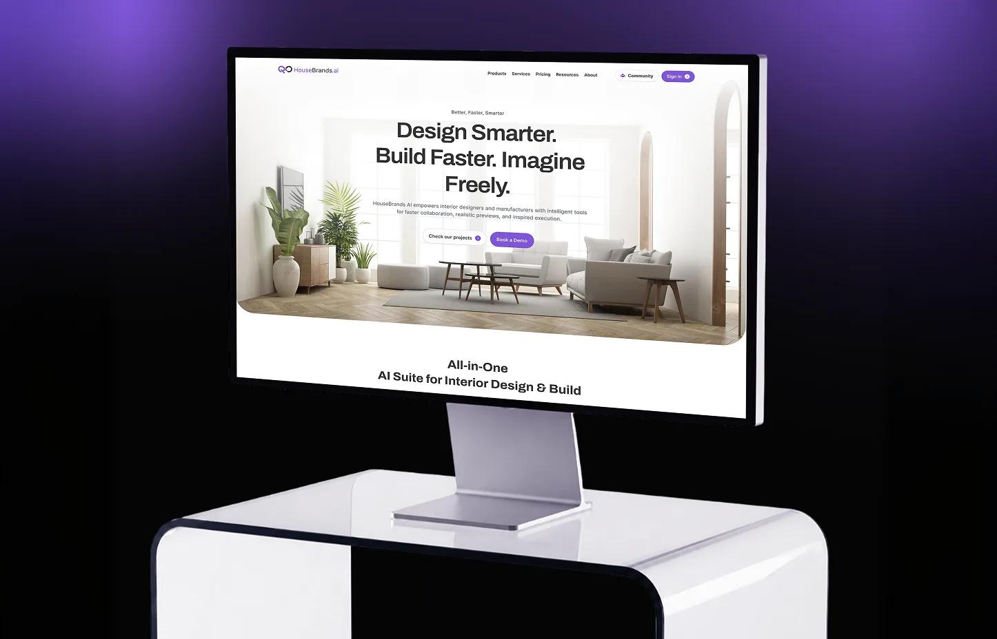 HouseBrands AI website shown on a monitor stand