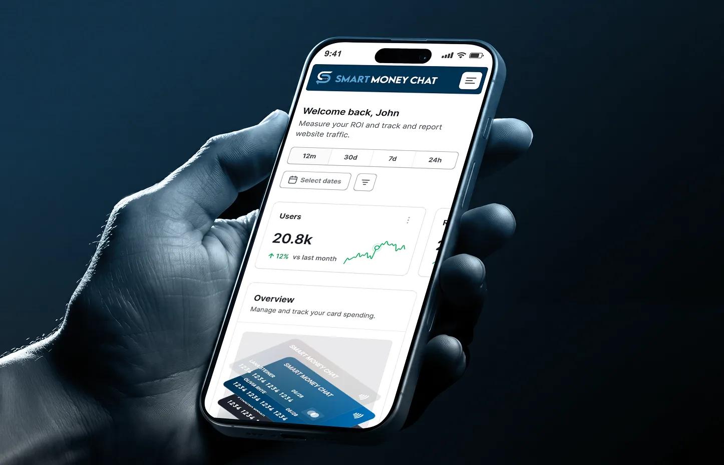 Hand holding smartphone showing Smart Money Chat mobile app dashboard