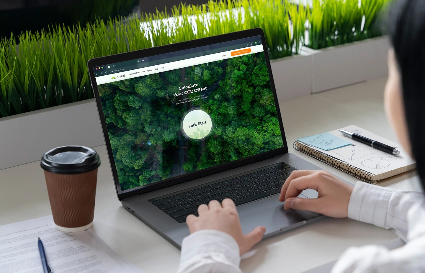 Person using the Ertho platform on a laptop