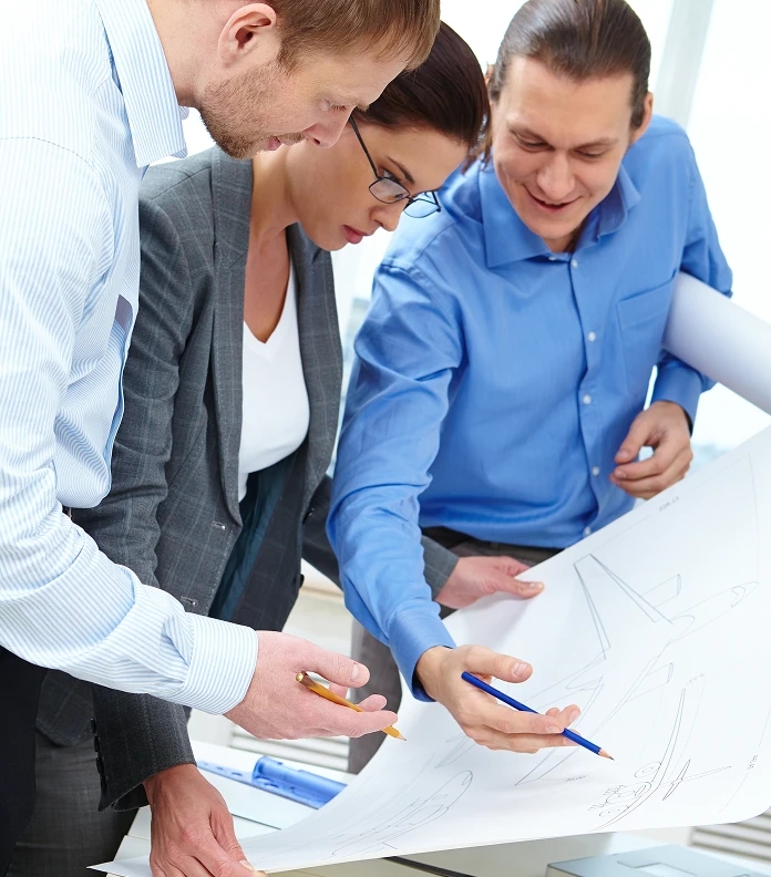 Team reviewing workflow plans