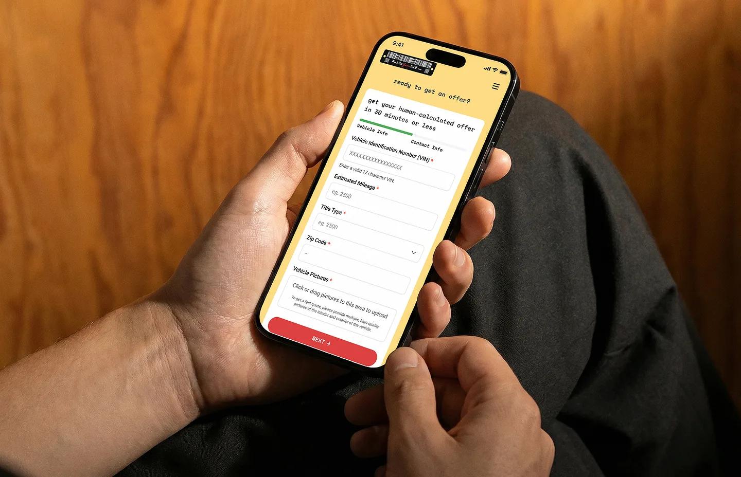 PutInYourVIN.com vehicle submission form shown on a mobile phone