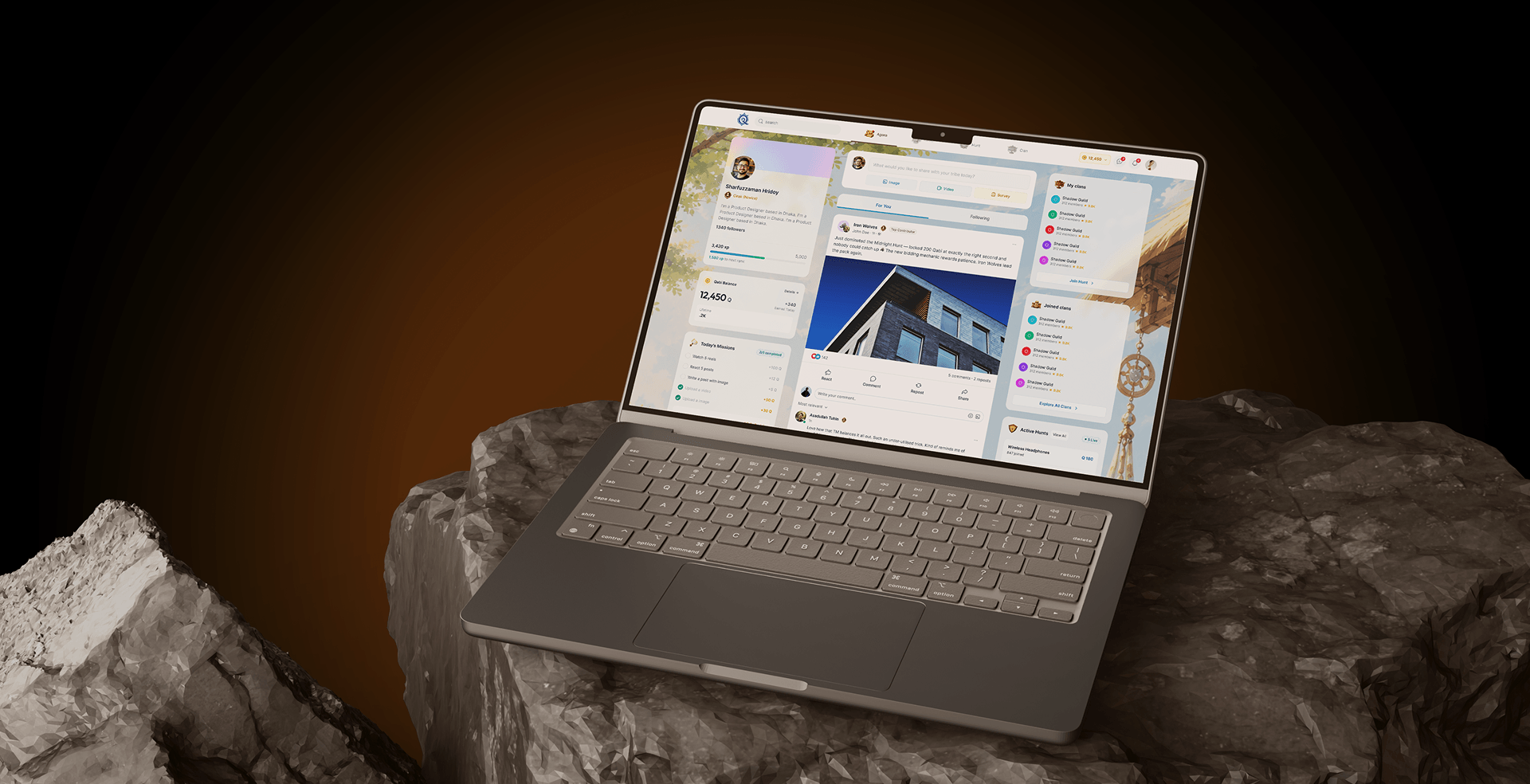 Qabiile platform dashboard displayed on a laptop on top of stones
