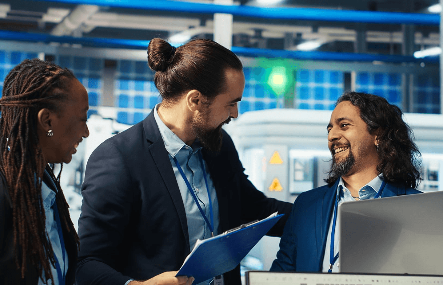 specialists reviewing systems in a server room