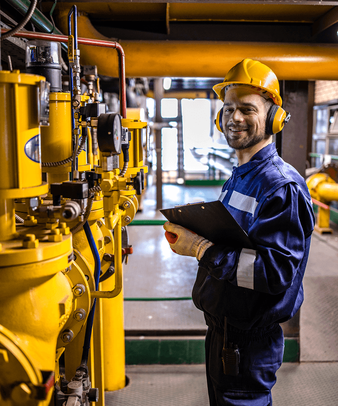 Gas Engineer inspecting valves