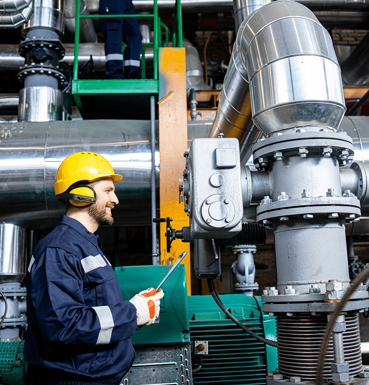 Gas Engineer working on industrial piping equipment