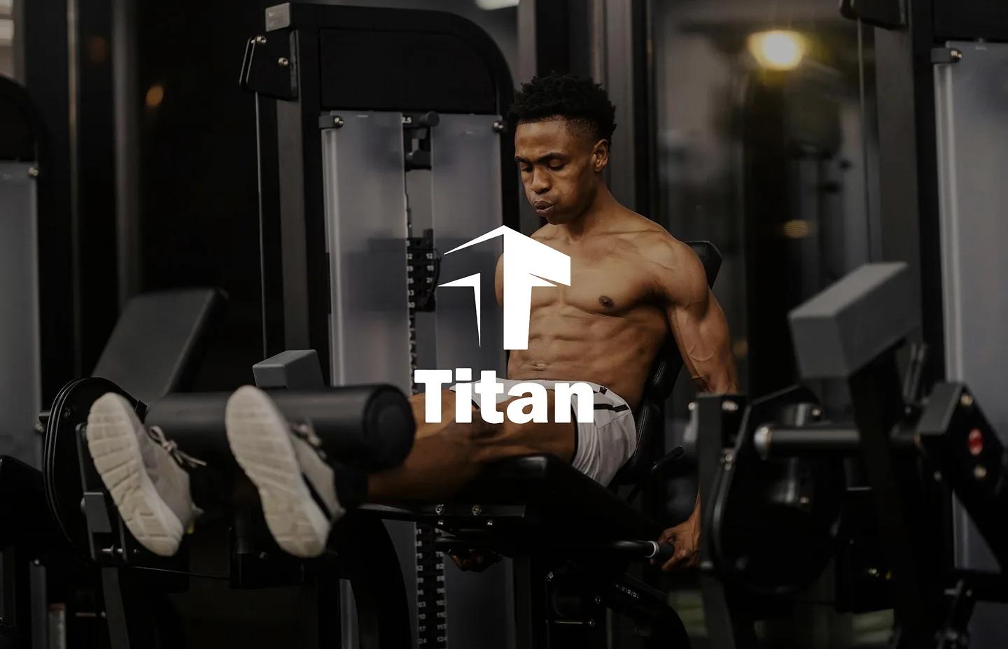 Man training in the gym with the Titan logo overlay