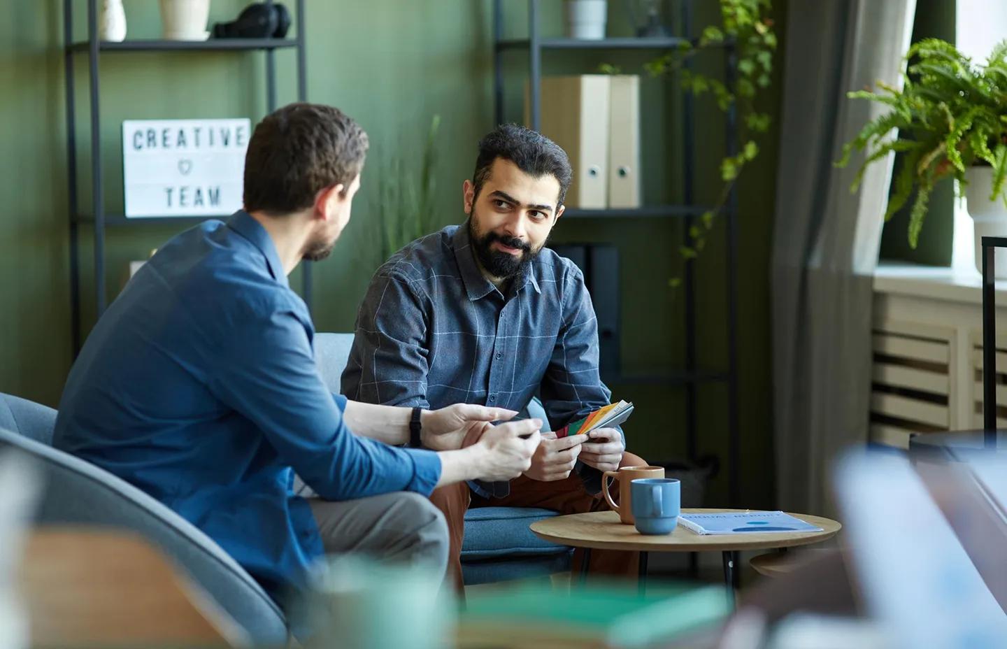 Two men in a consultation conversation
