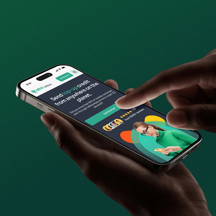 Hand holding a smartphone showing the Viva Bill Pay app screen